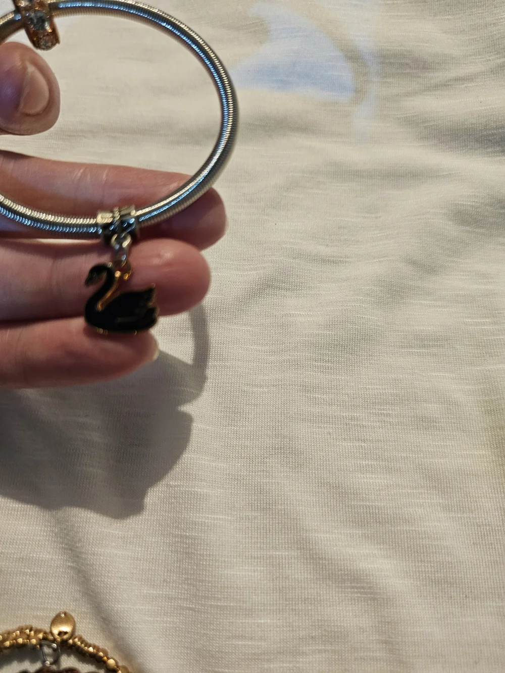 Elegant Silver-Tone Bracelet with Rose Gold Crystal Beads and Swan Charm